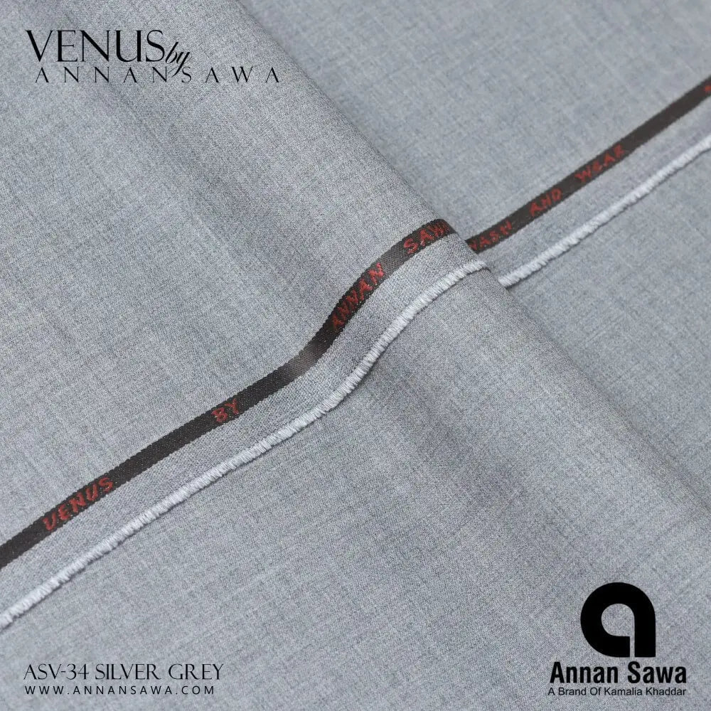Close-up of silver grey wash and wear fabric with Annan Sawa branding.