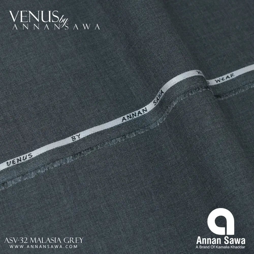 Close-up of malasia grey wash and wear fabric with Annan Sawa branding.
