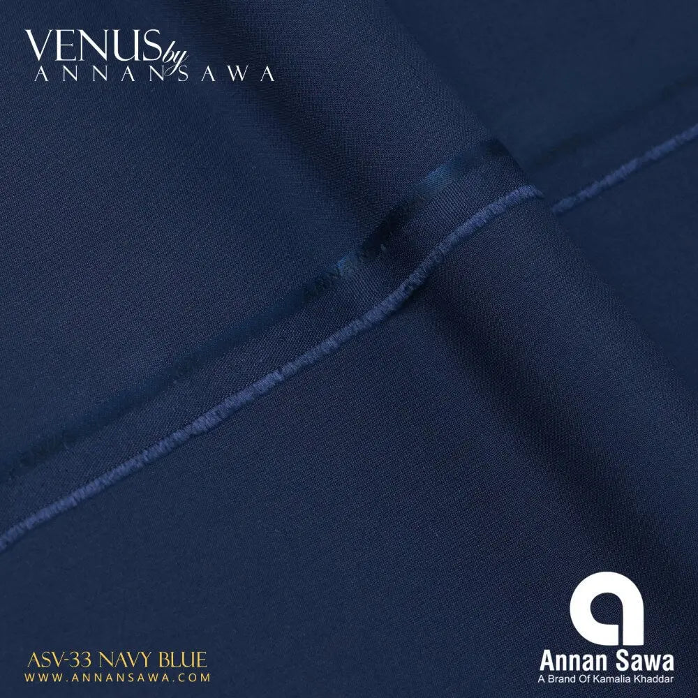 Close-up of navy blue wash and wear fabric with Annan Sawa branding.