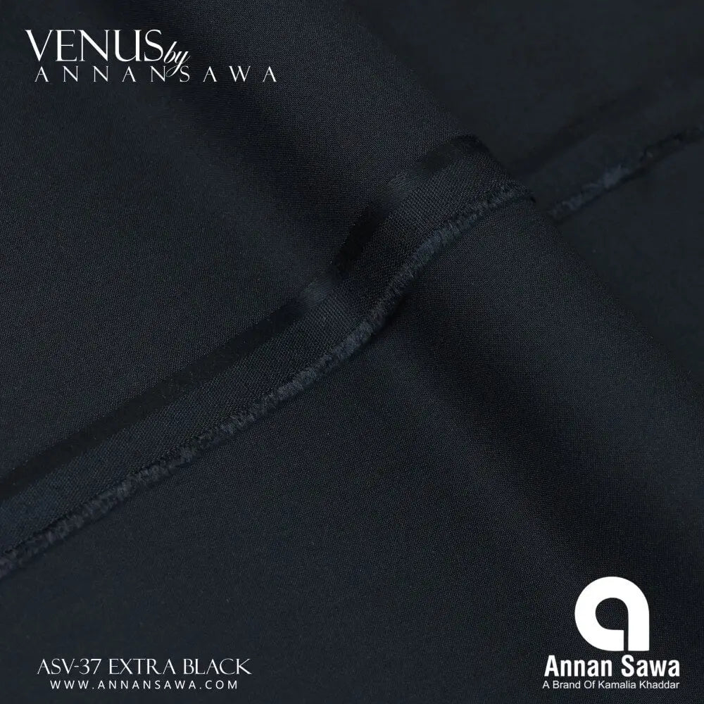 Close-up of extra black wash and wear fabric with Annan Sawa branding.